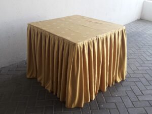 Cake table with gold skirting